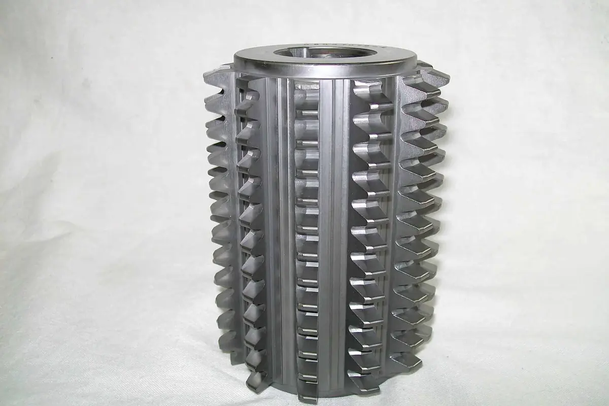 A gear cutting hob finished in a dark aluminum chromium titanium nitride coating